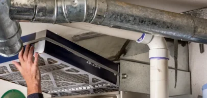 furnace filter being installed
